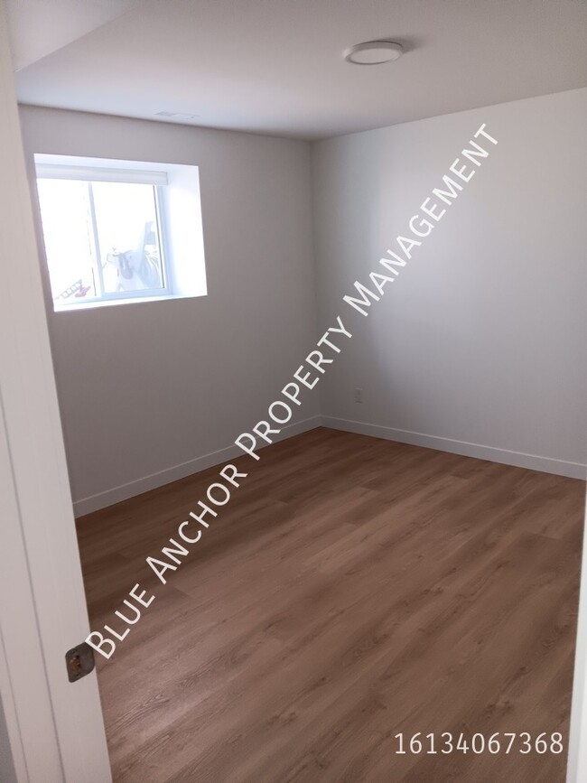 Photo du bâtiment - Brand New 2-Bedroom Basement Unit in Quint...