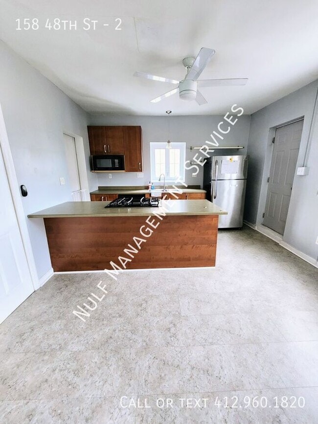 Photo - 158 48th St-2 Apartments