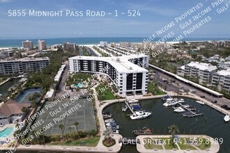 Building Photo - 5855 Midnight Pass Rd