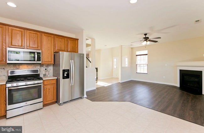 Kitchen and living room - 205 Kintyre Ln