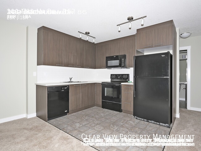Building Photo - Chestermere Station 2 bed condo!