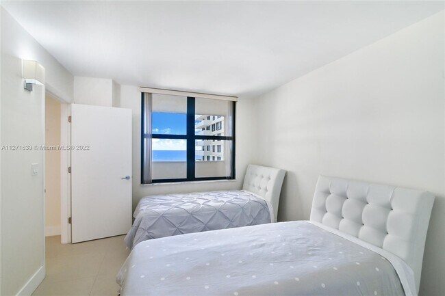 Building Photo - 9801 Collins Ave