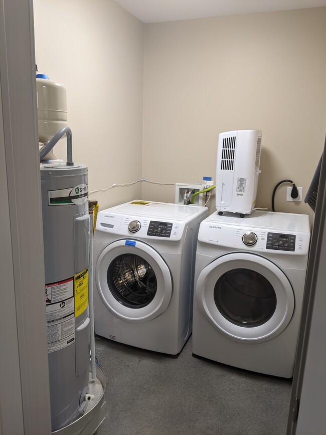 Laundry room. *units are now stacked and there is shelving beside them. - 84 Middlemont Ave #2