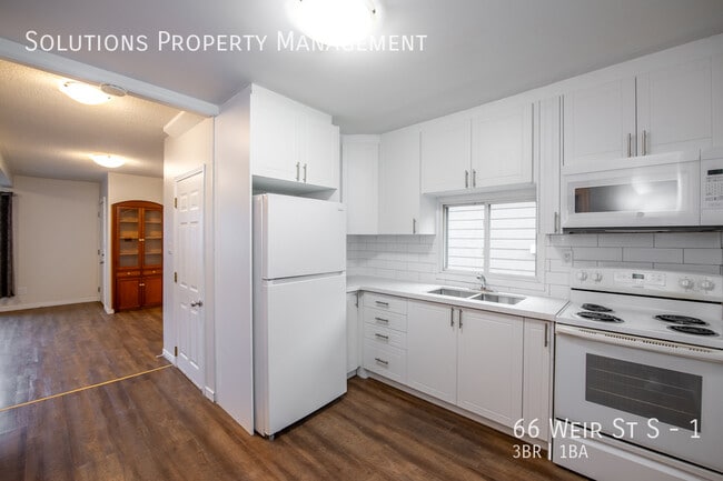Building Photo - **Newly Renovated 3 Bedroom Main Floor Unit**