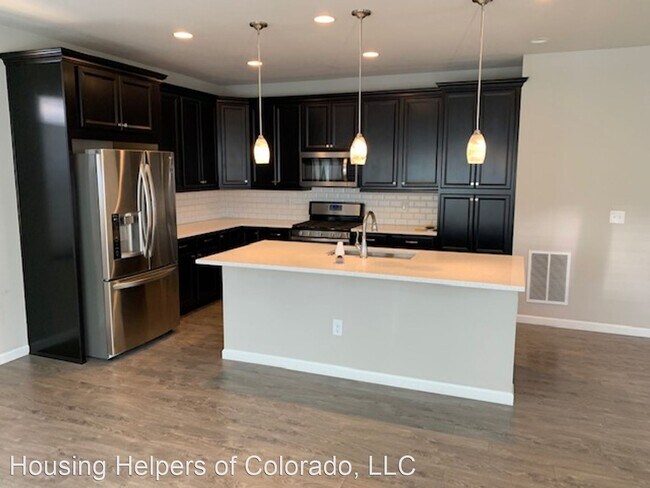 Building Photo - 3 br, 2.5 bath House - 15136 W 94th Avenue