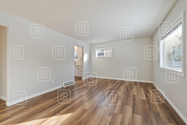 Building Photo - 6523 E 9th Ave