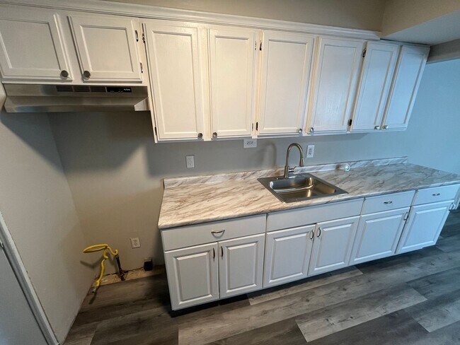 Building Photo - Spacious Four Bedroom Coming Available Soon!