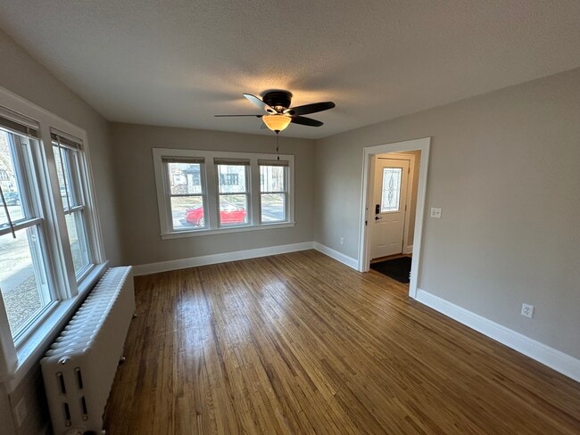 Living room and front entry - 235 Logan Ave N