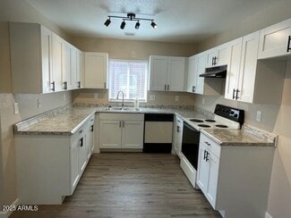 Building Photo - 10854 W Carousel Dr