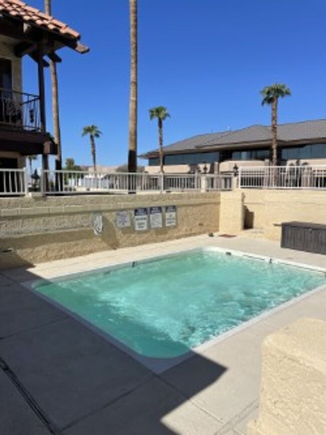 Building Photo - Spacious 3 bedroom, 3 bath, condo with a l...