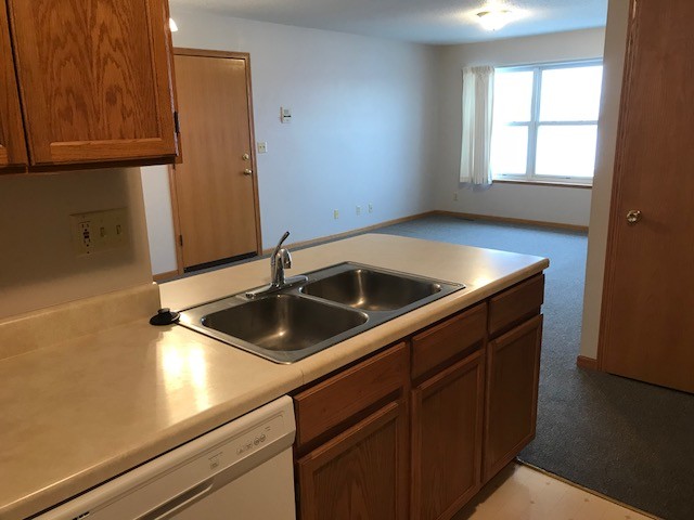 Kitchen opens up to living and dining areas - 1603 Breca Ridge Dr