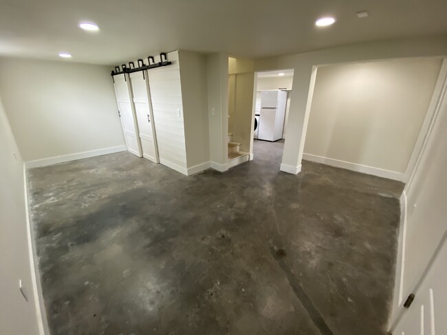 Wide angle of rec room - 214 Naval Ave