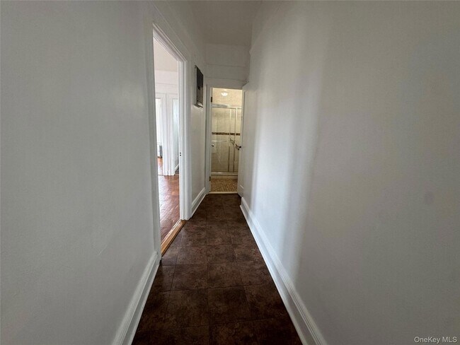 Building Photo - 7438 Jamaica Avenue Unit