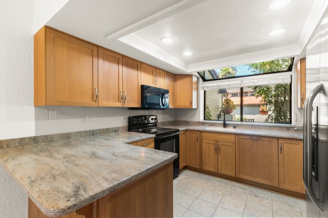 Building Photo - 4871 El Cid Dr