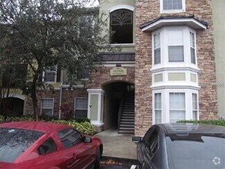 Building Photo - 9916 Courtney Palms Blvd