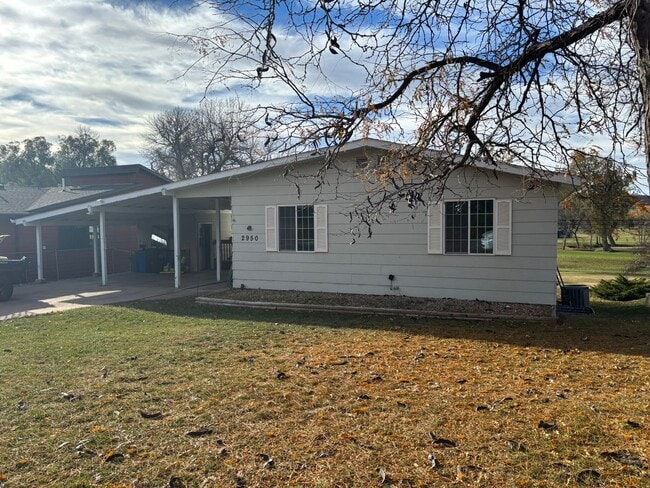 Building Photo - 5 BED | 3 BATH | CARPORT | WEST RAPID