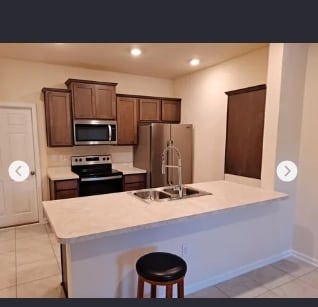 Kitchen open to dining area and living room - 86808 Mainline Rd