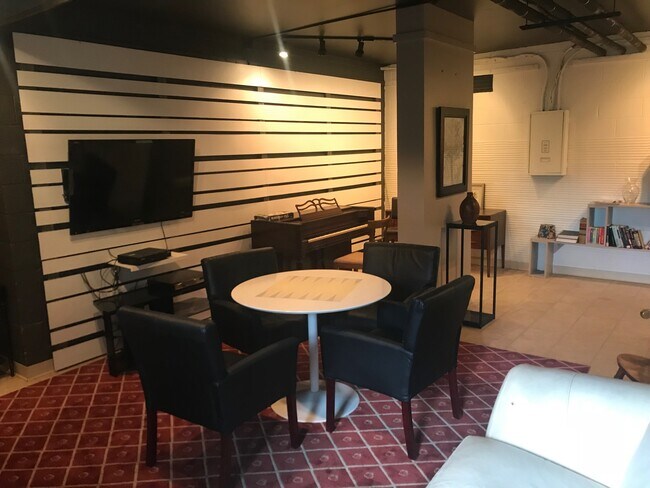 Communal Media/Game Room that is available all year long to host guests. Perfect space to watch the game or reserve is for the Emmy's! - 80 Cartright St