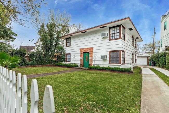 From the white picket fence & lush green yards (front and back) to the detached garages. - 3911 Law St
