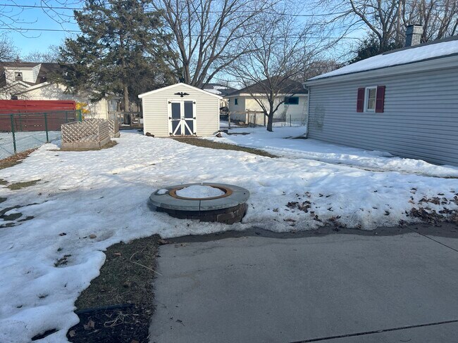 Firepit, storage shed - 2624 S Kernan Ave