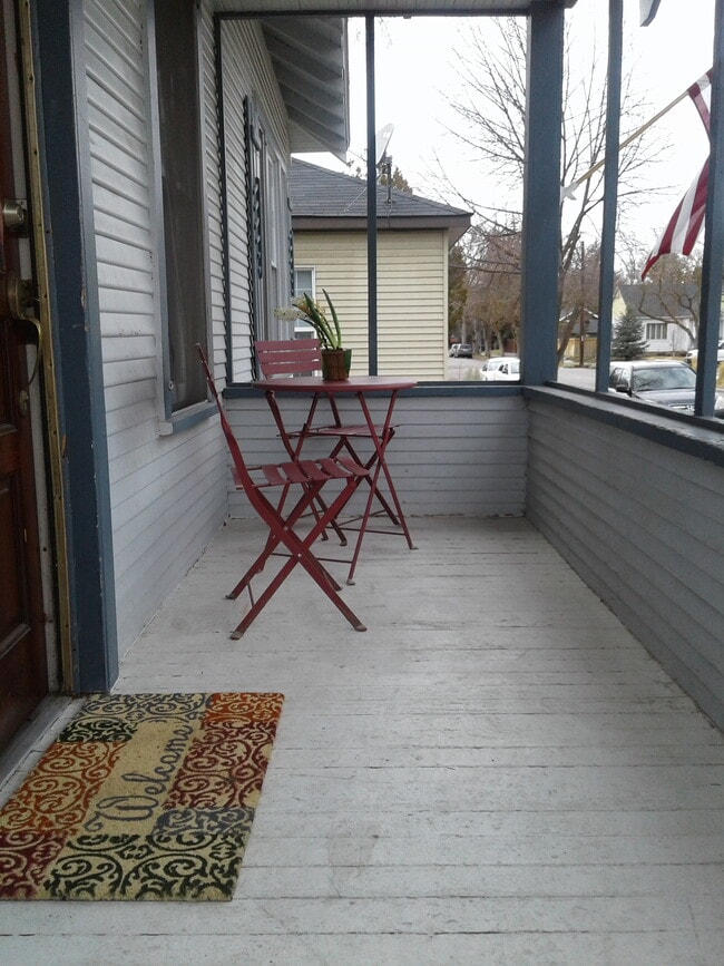 Sip coffee from the front porch while you watch the world go by. - 1509 West Hazel Street