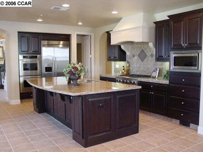 Building Photo - The gorgeous property in the Bridges commu...
