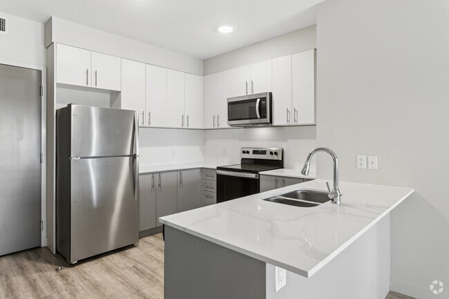 2BR, 2BA - 900SF - Kitchen - Le Louvre Residences