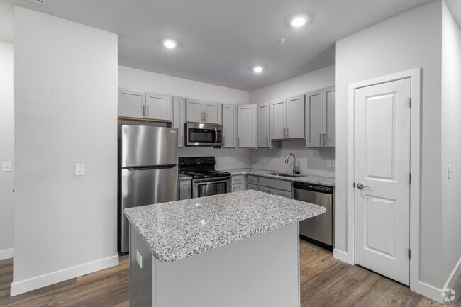 3 BR, 2 BA - 1373SF - Kitchen - Coastal Tide Apartments