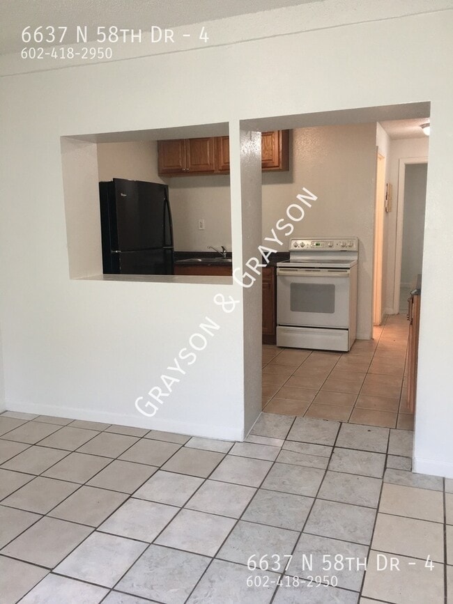 Building Photo - 6637 N 58th Dr