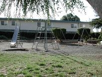 área de juegos para niños - Orange Tree Apartments