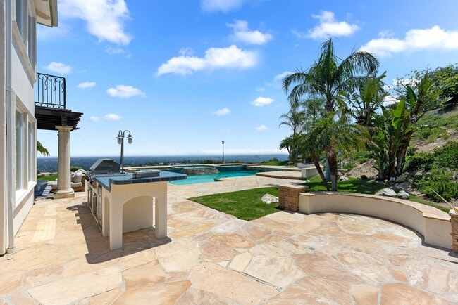 Building Photo - A Private Hillside Haven with Sweeping Val...