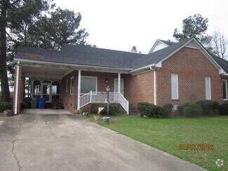 Building Photo - 4801 Olympic Ln N