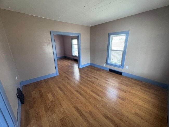 Building Photo - Spacious 4-Bed Home Near Schools with Back...
