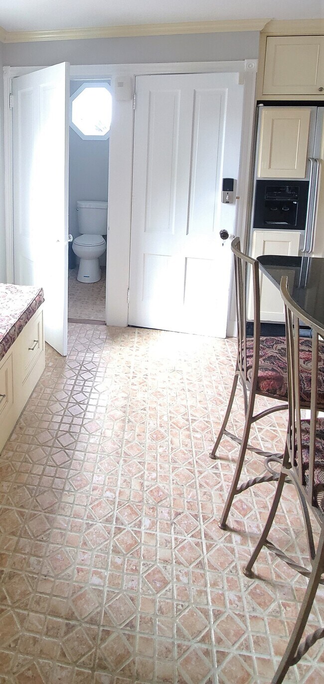 A half bath off the kitchen - 130 Touro St