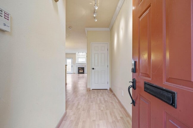 Building Photo - $500 move-in special! Unique 2-bdrm/2.5-bath duplex w/ A/C—Private patio, storage, garage w/ wash...