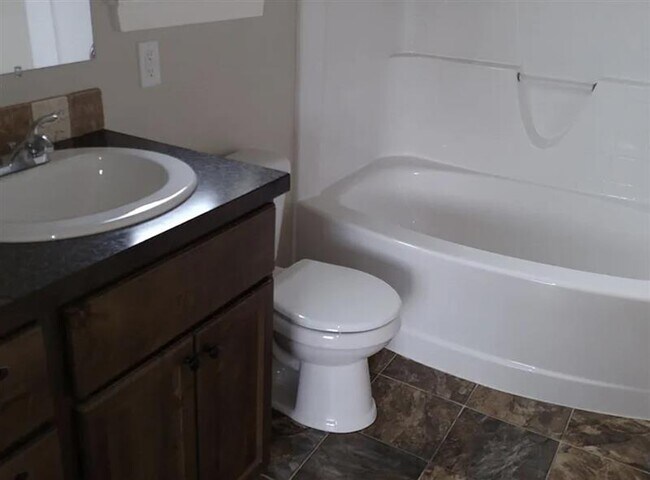Building Photo - A newer, 5 year old home, with open floor ...