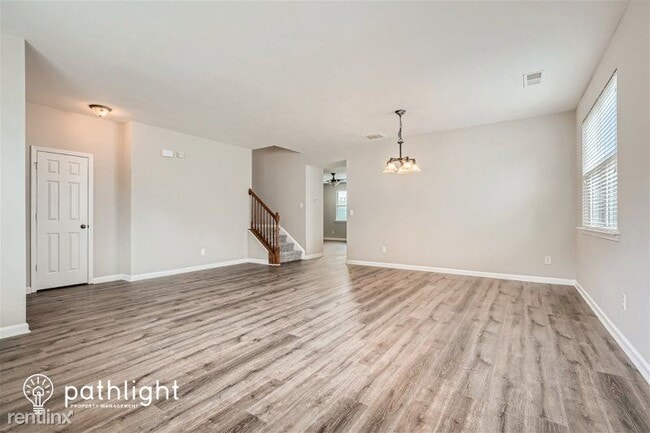 Building Photo - 4 br, 2.5 bath House - 6573 Waterton Ave S...
