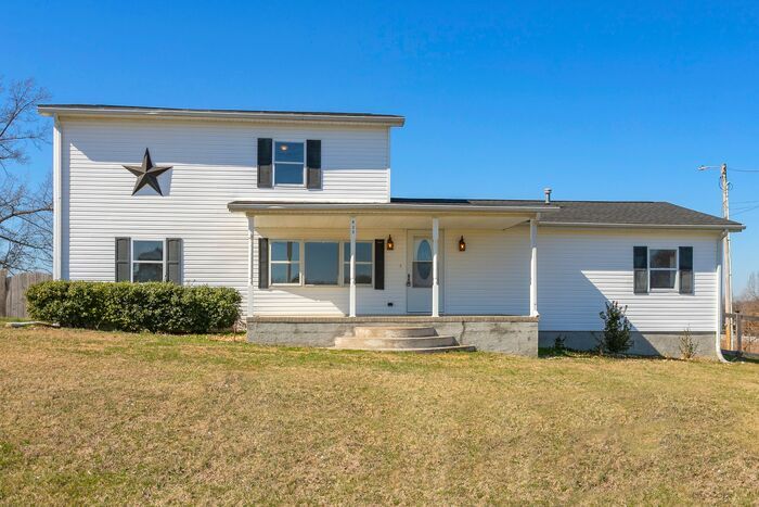 Primary Photo - Charming Farmhouse on .64 Acres in Adams, TN!