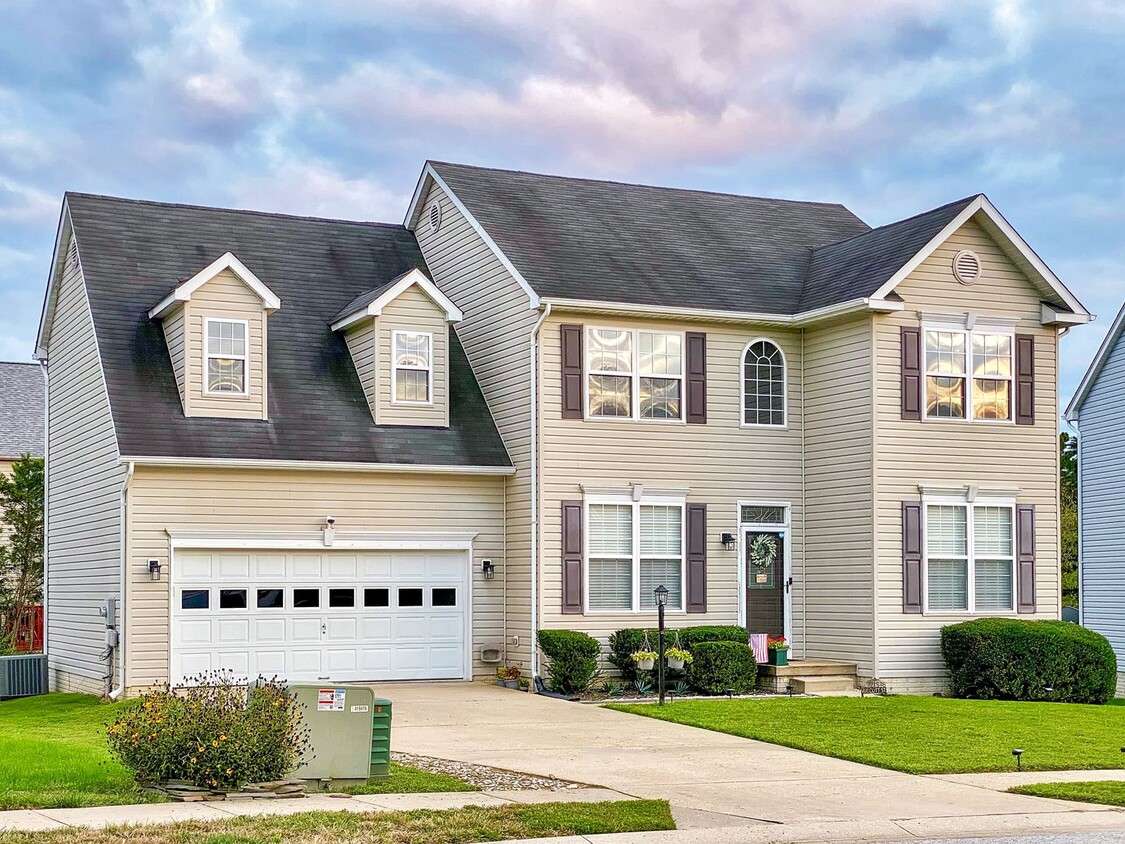 Primary Photo - Colonial with Finished Basement and 2 Car ...