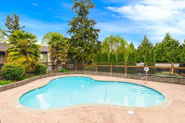 Building Photo - Welcoming Top Floor 1 Bedroom Condo - Gated Community with Parking