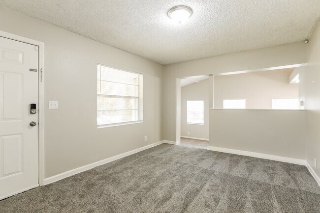 Building Photo - 6385 Woodman Dr