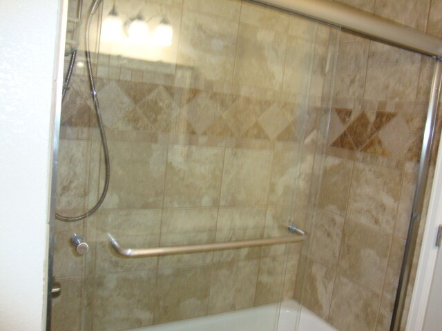 tiled tub - 13022 W 75th Pl