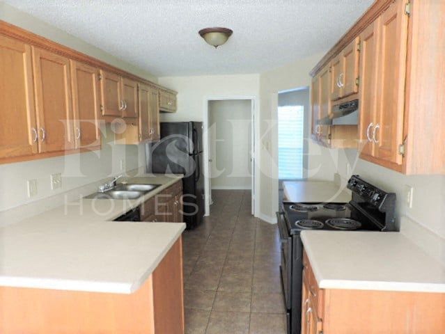 Foto del edificio - 7469 Midnight Cove
