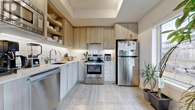 Photo du bâtiment - 155-155 Downsview Park Blvd