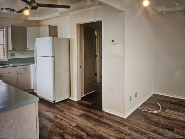 New flooring of open living room and kitchen - 3495 Redwood Ave