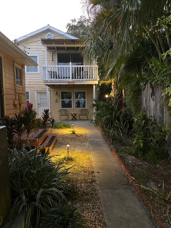 entry walk in evening - 1527 1/2 Beach Dr SE