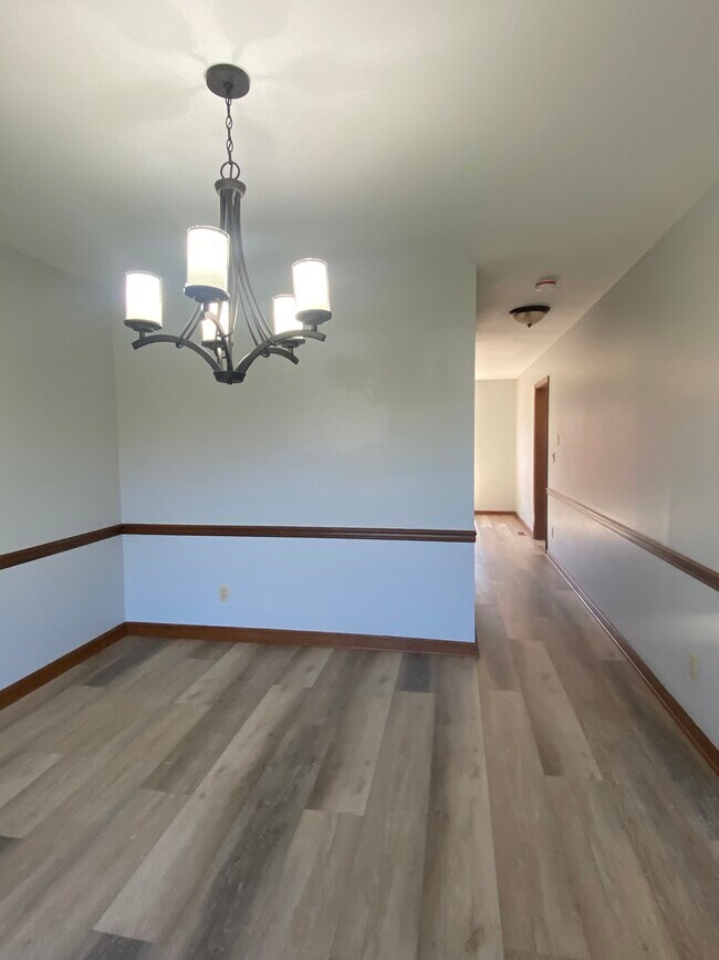 Dining Room leading to hall bath and kitcher - 140 Peppercorn Sq
