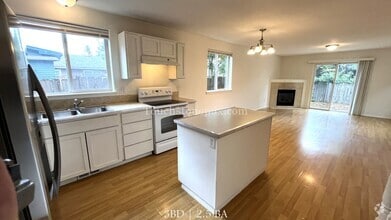 Building Photo - 1227 NE 84th Ave