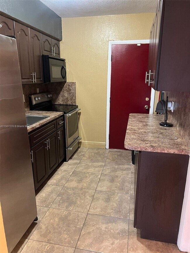 Building Photo - 1270 Northwest 72nd Street Apt #1270, Miam...