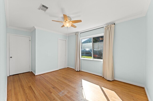 Side bedroom, full of light, new ceiling fan. - 1745 Kipling St